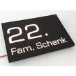 Zwart naambord met verlichting